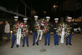 Ready to carry the wreaths to the monument from the ceremony venue